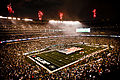 Service members unfurl flag at NY Jets first home game at new Meadowlands Stadium.jpg