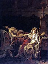 une femme assise avec son enfant, se lamente auprès du cadavre d'un homme couché torse nu