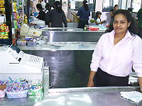 Cashier at her register.jpg