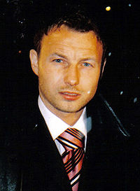 Portrait de Tomasz Frankowski.