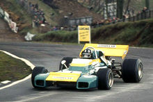 Photo de Graham Hill pilotant une Brabham BT34.