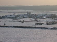 Vue générale du village d'Aulnois en hiver