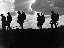 Battle of Broodseinde - silhouetted troops marching.jpg