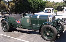 Vue de profil d'une Bentley Speed Six dans sa livrée nationale, le vert anglais.