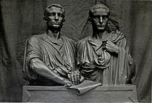 Sculpture des deux frères. Le regard sévère, les deux ont une main sur un parchemin, et l'un a une main posée sur l'épaule de son frère qui maintient sa toge.