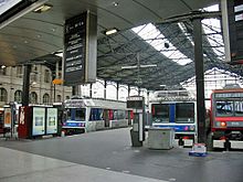 À la gare de Paris-Saint-Lazare.