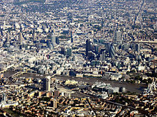 An aerial photograph of the City of London and its surrounding London boroughs.