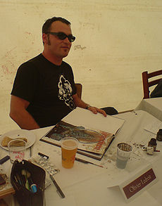 Olivier Ledroit lors d'une séance de dédicace au Château de Comper, au Centre de l'imaginaire arthurien, en août 2007.