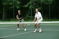 Georges Bush & Chris Evert playing tennis at Camp David.jpg