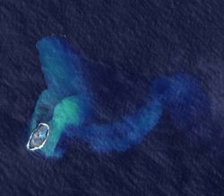 Image satellite du Home Reef émergé en 2006.