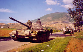 Albanian army deploys T-59 tanks near Kosovo border, May 1999 (Robert Wright).jpg