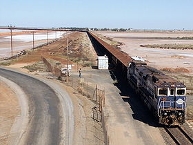 Train transportant du mineraide fer arrivant en gare de Port Hedland.