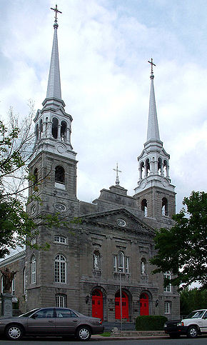 Église Sainte-Geneviève.Localisation de L'Île-Bizard–Sainte-Geneviève dans Montréal.Logo de l'arrondissement.