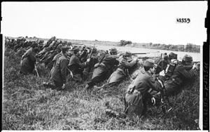 French soldiers waiting assault behind a ditch