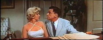 Ewell leans in for kiss in The Seven Year Itch trailer 1.jpg