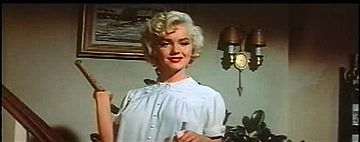 Monroe holding hammer in The Seven Year Itch trailer 2.jpg