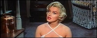 Monroe listening in The Seven Year Itch trailer 1.jpg