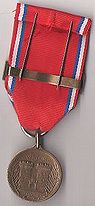 Médaille de Verdun du colonel Brébant (verso).jpg